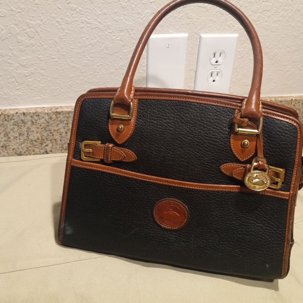 Dooney and Burke brand, all weather leather hand carry bag, Excellent Condition